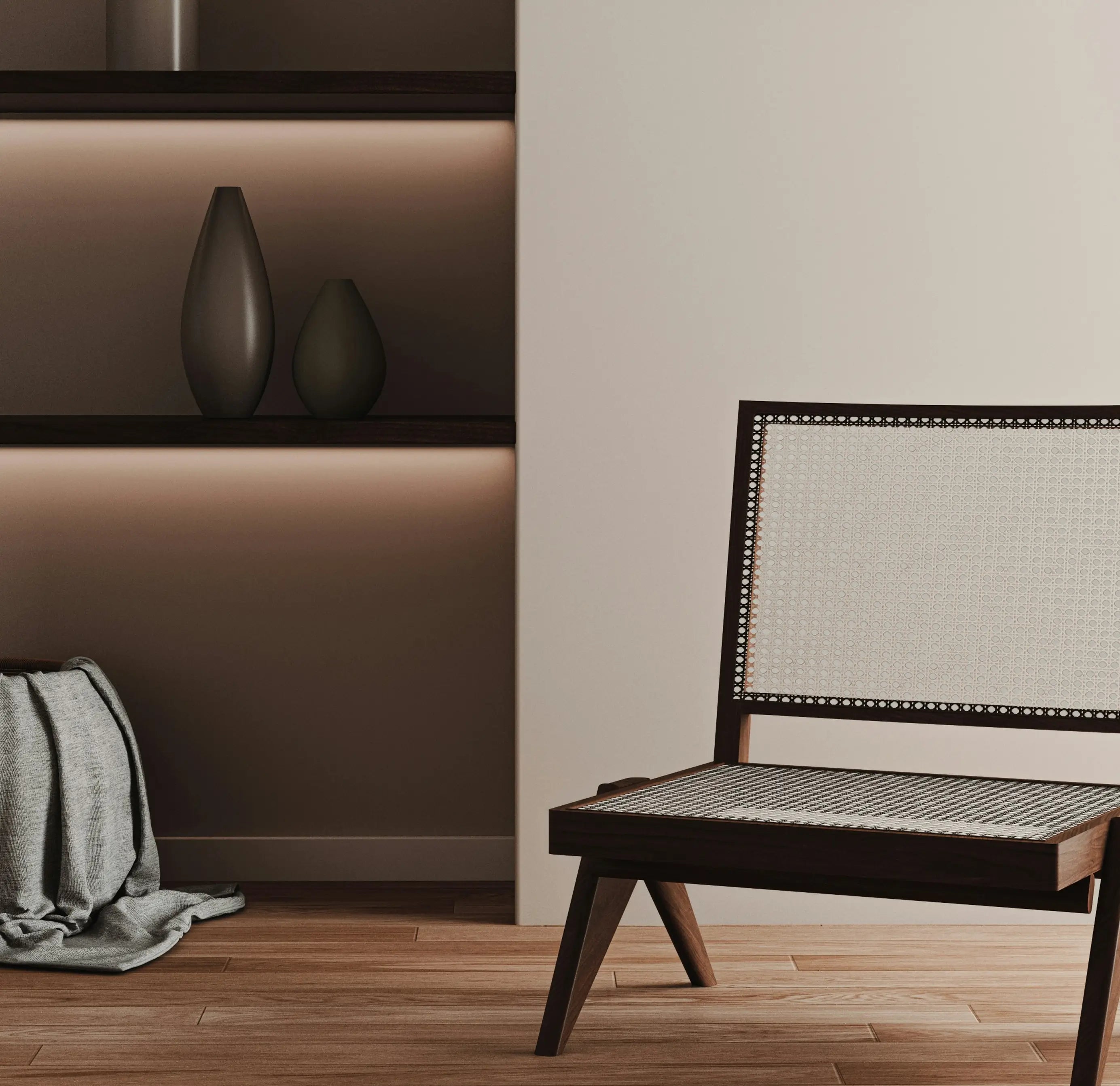 Modern chair with woven seat against a neutral wall with decorative vases.